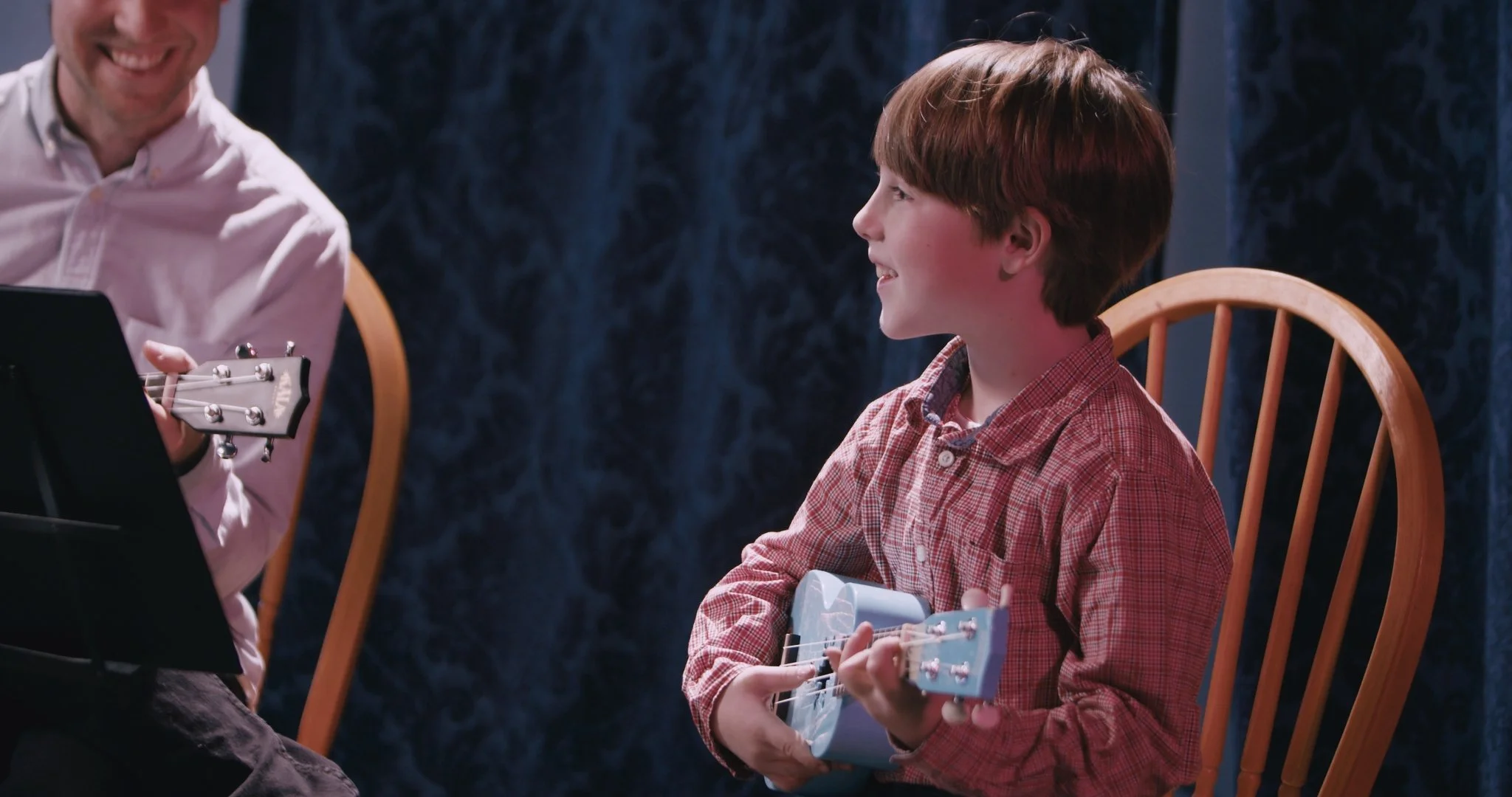 Liam Britten with a student
